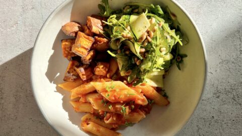 Tomato pasta, sweet potato and arugula pesto salad . The tangy tomato and fresh citrus crunch works so well with the sweet potato, not to mention my great love for pairing warm and cold food!